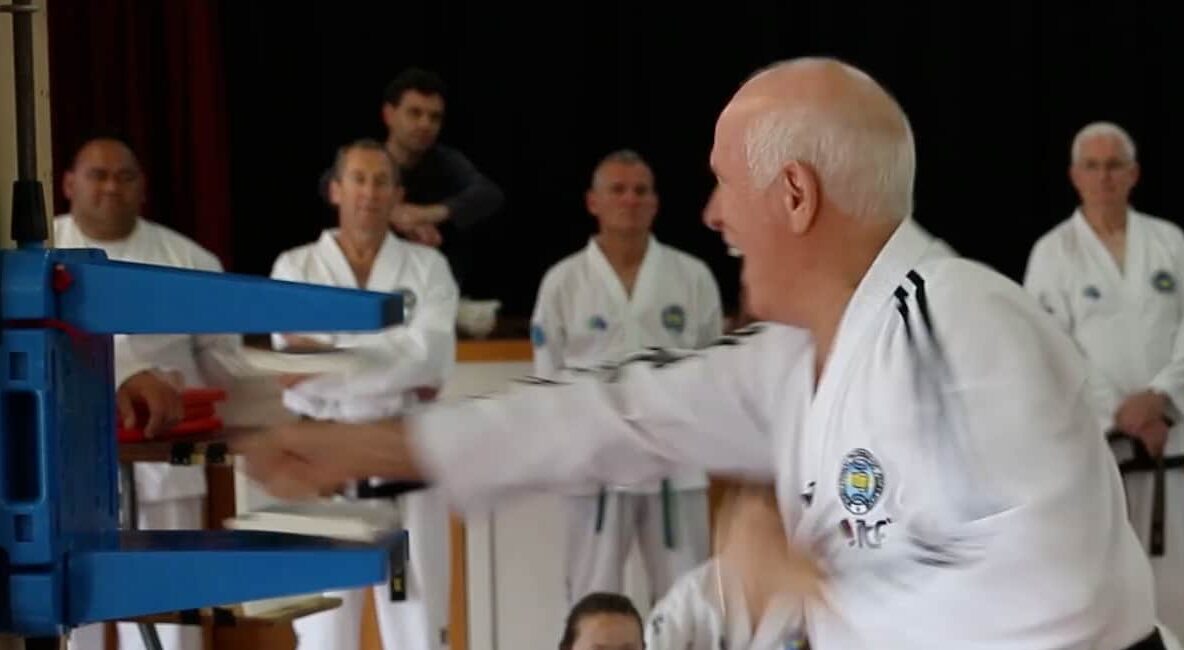 Grand Master Rounthwaite demonstrating power breaking posture during his seminar.