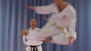 Expert Coach Brendan Doogan teaching the ITF overhead kick using structured drills with students