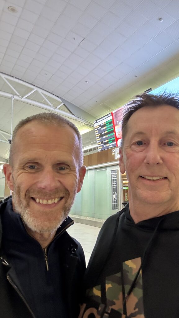 Master Mark Hutton and GM Paul McPhail at a cafe in 2025