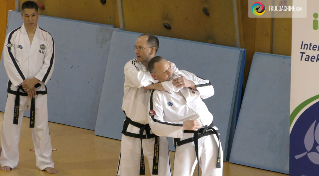 Rear strangle hold discussed in this self-defence video