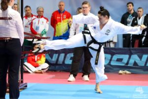 Kyla Walton from New Zealand winning Gold in Power breaking at ITF World Champs