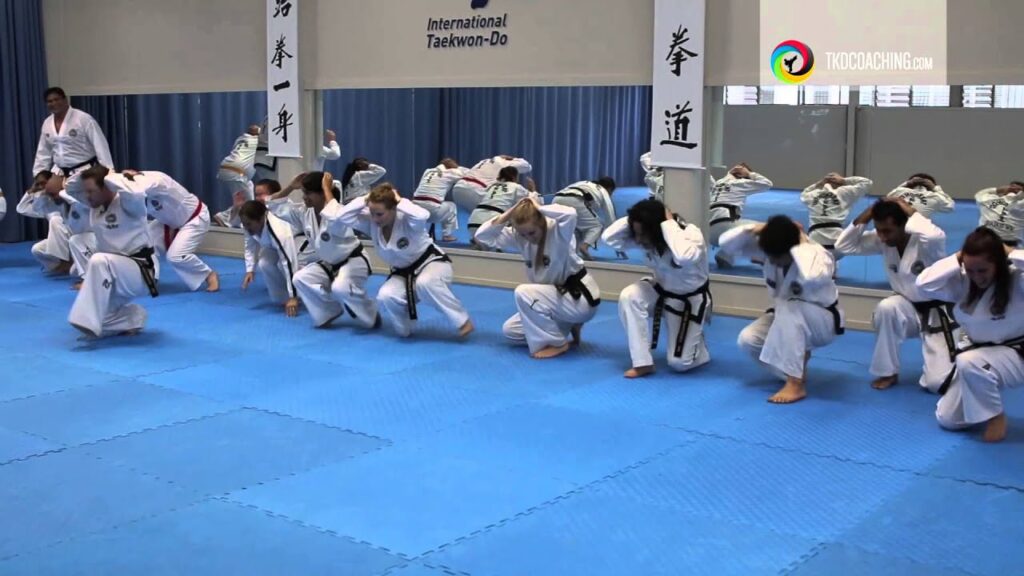 Alt: “Chris Broughton teaching kids Taekwon-Do through games”